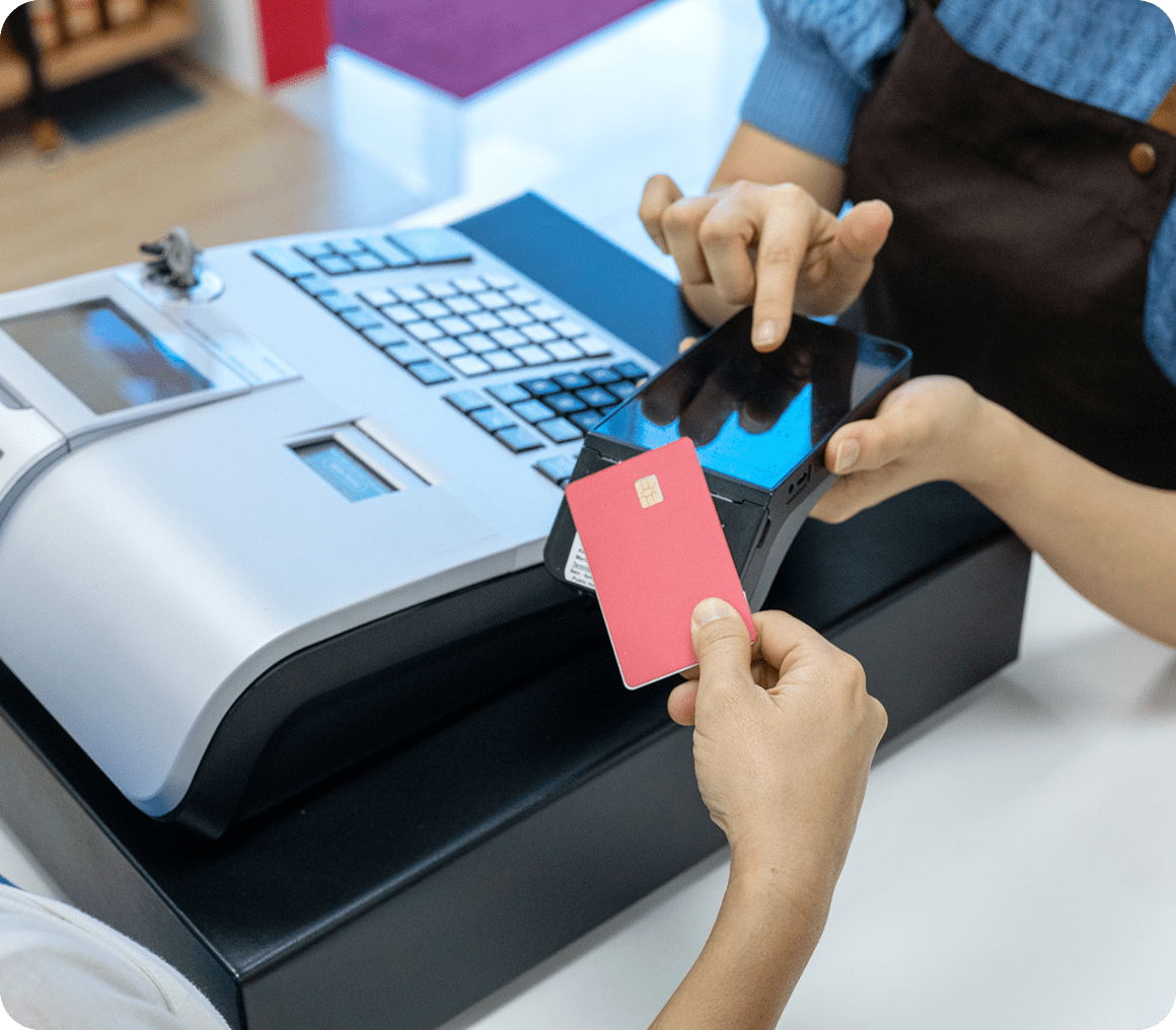 Customer paying with phone and card