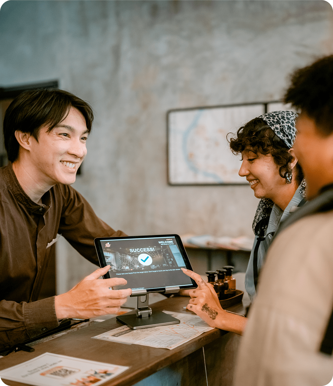 People interacting at checkout counter