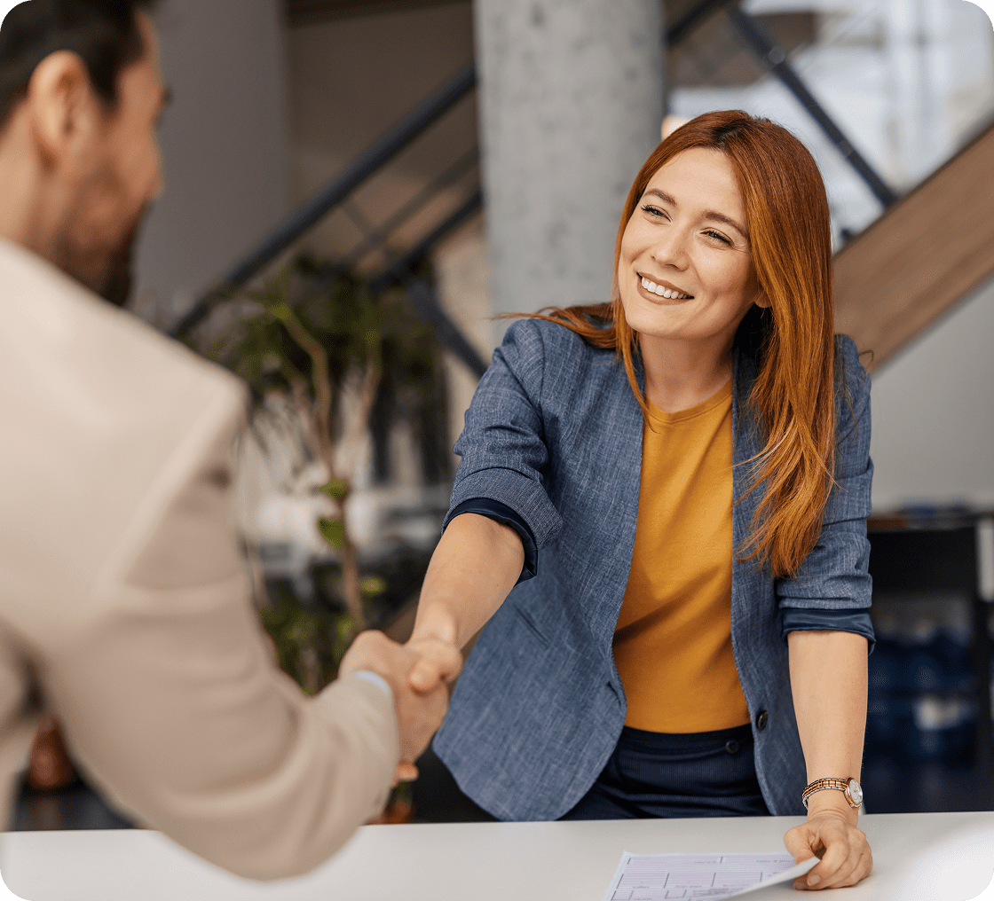Professional handshake in office setting