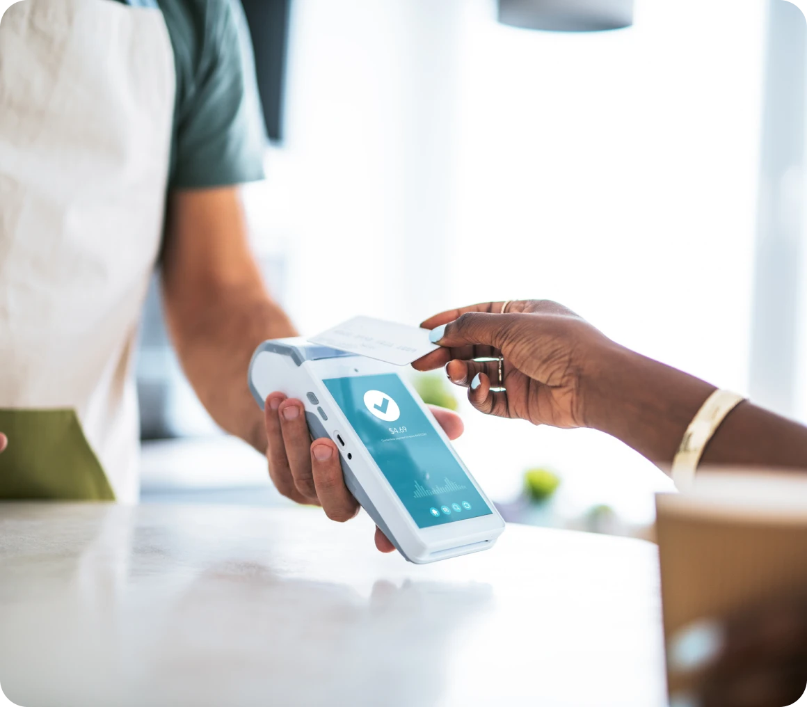 Customer using card reader for payment